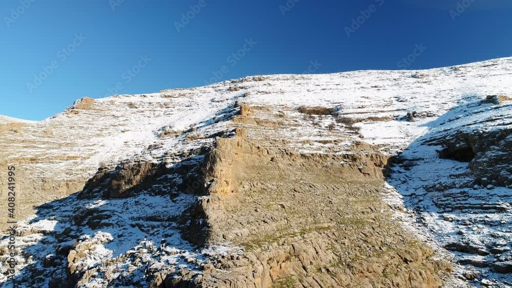 Aerial view of snow capped rocks and mountains in Mardin. 4K Footage in Turkey Aerial view of snow capped rocks and mountains in Mardin. 4K Footage in Turkey