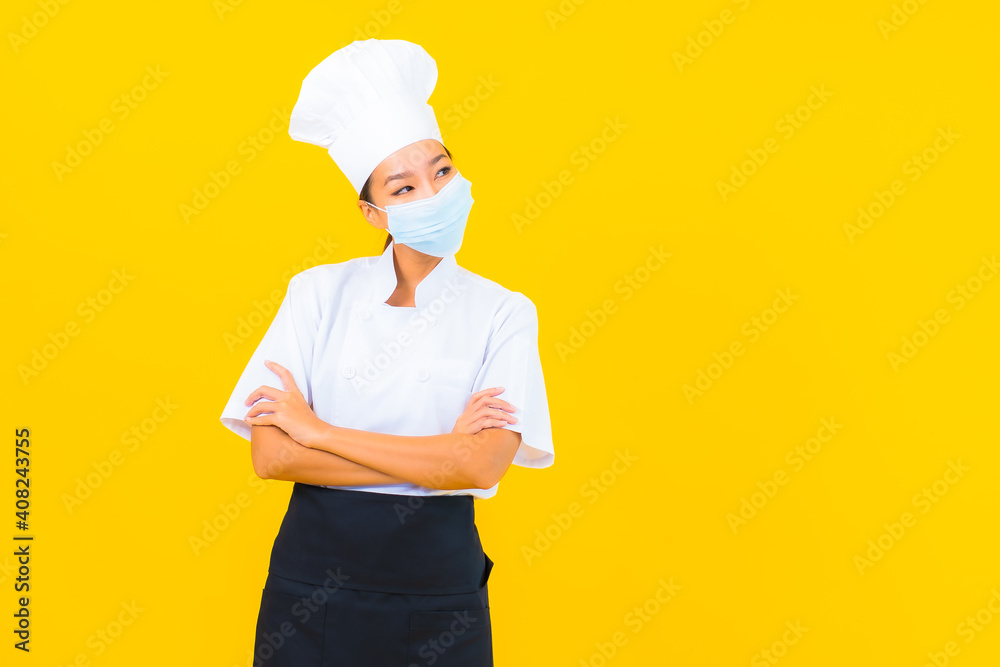 Portrait beautiful young asian woman chef wear mask for protect covid19 or coronavirus