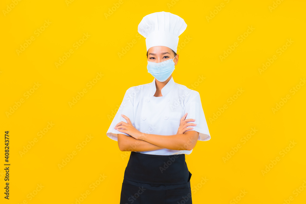 Portrait beautiful young asian woman chef wear mask for protect covid19 or coronavirus