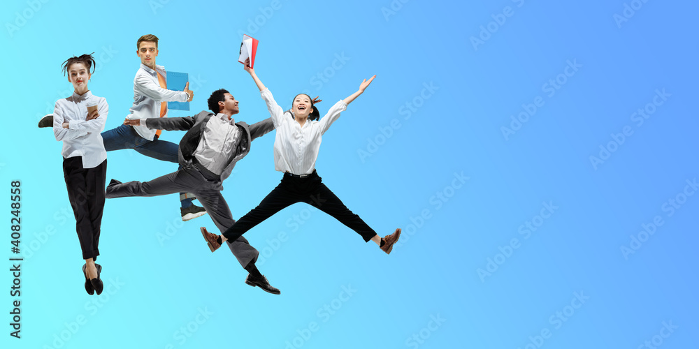 Cold. Happy office workers jumping and dancing in casual clothes or suit isolated on gradient neon fluid background. Business, start-up, working open-space, motion, action concept. Creative collage. Cold. Happy office workers jumping and dancing in casual clothes or suit isolated on gradient neon fluid background. Business, start-up, working open-space, motion, action concept. Creative collage.