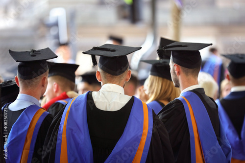 University graduates at graduation ceremony