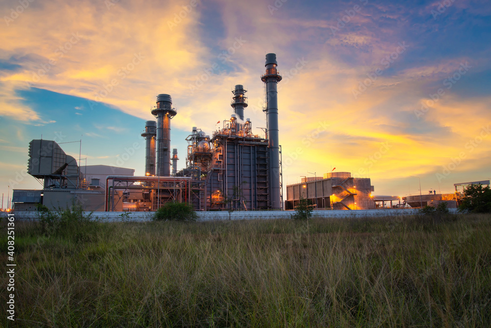Oil refinery plant chemical factory and power plant with many storage tanks and pipelines at sunset. Oil refinery plant chemical factory and power plant with many storage tanks and pipelines at sunset.
