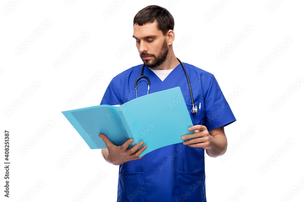 healthcare, profession and medicine concept - doctor or male nurse in blue uniform reading medical report in folder over white background