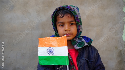 Ecstasy boy with Great Indian Flag. Patriot little kid affection with tricolor flag or Tringa. photo