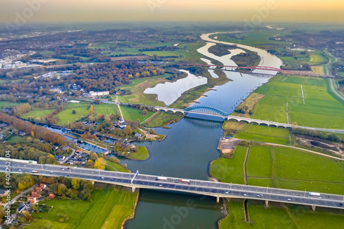 Lowland river IJssel with bridges photo