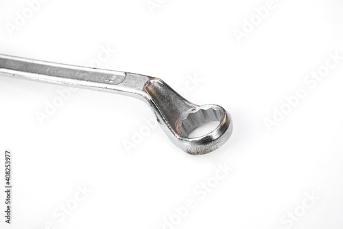 Ring wrench on white background.