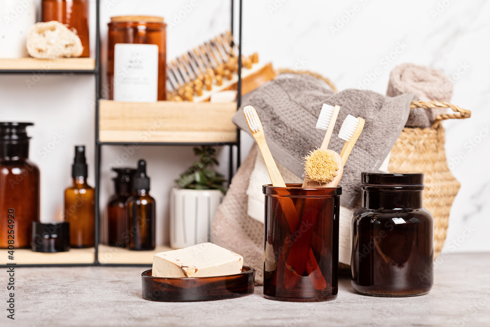 Bamboo and glass accessories for bath - jars, soap bar, brushes for personal hygiene. Zero waste, organic, plastic free, sustainable decor for bathroom Bamboo and glass accessories for bath - jars, soap bar, brushes for personal hygiene. Zero waste, organic, plastic free, sustainable decor for bathroom