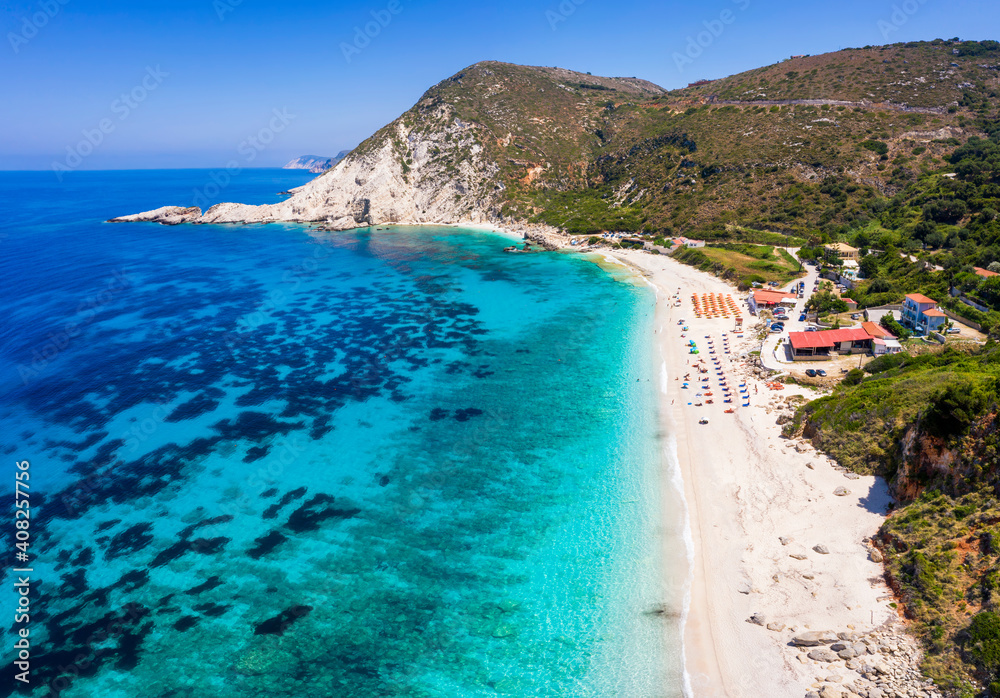Aerial view to the popular beach of Petani on the island of Kefalonia, Greece, with turquoise sea and fine pebbles