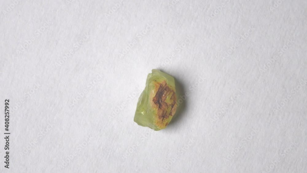 Peridot gemstone on turn table Peridot gemstone on turn table