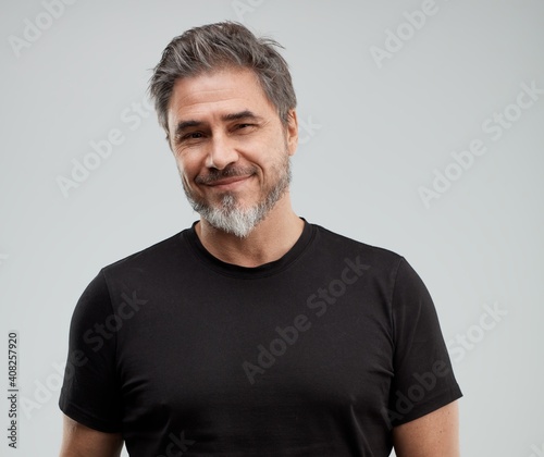 Stampa su tela Portrait of happy older white man, beard gray hair, smiling