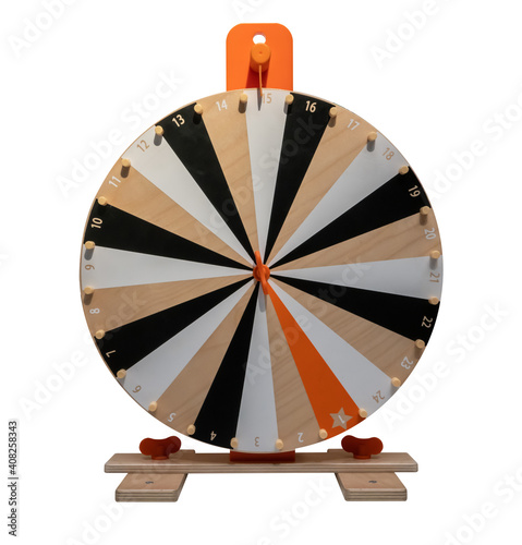 Wooden wheel of fortune game isolated on white background.