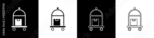 Set Hotel luggage cart with suitcase icon isolated on black and white background. Traveling baggage sign. Travel luggage icon. Vector.