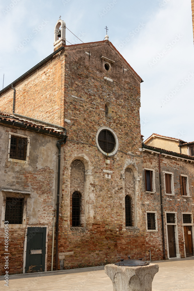 facade of a medieval brick building in venice