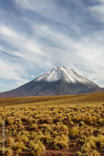Majestic scenery of Licancabur volcano with top covered with snow located in Chile