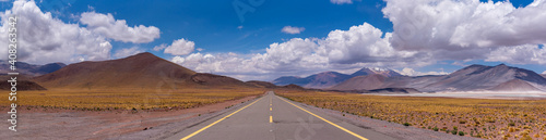 Scenic panoramic view of empty asphalt road going through Atacama Desert on sunny day in Chile © Bisual Photo