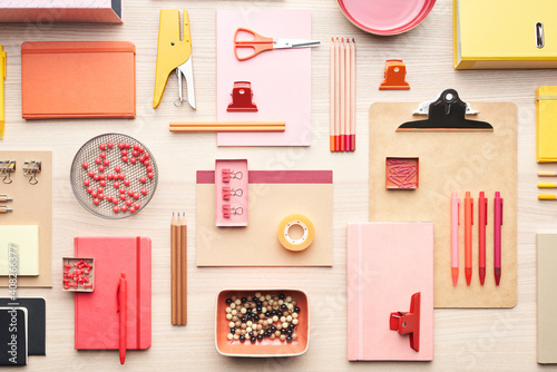 Composition of red stationery on table