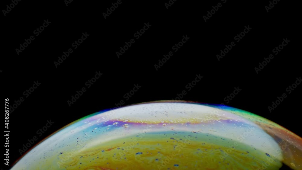 Close-up of cropped hemisphere of an abstract soap bubble