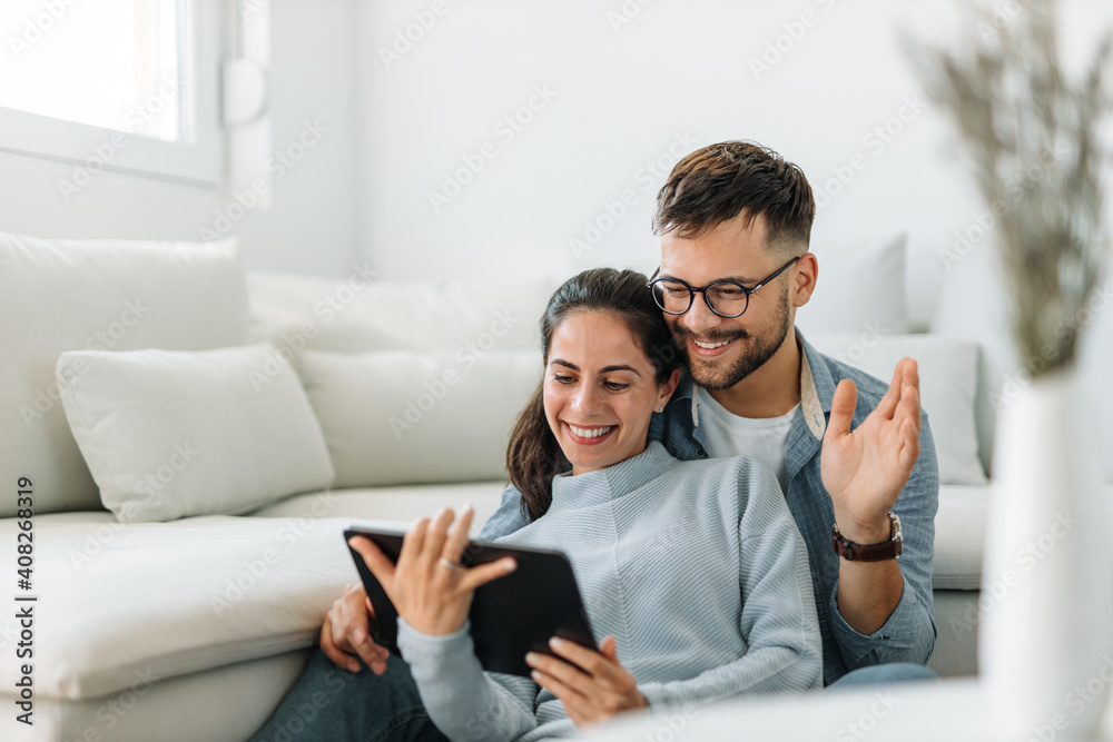 Waving hands, talking over the tablet. Waving hands, talking over the tablet.