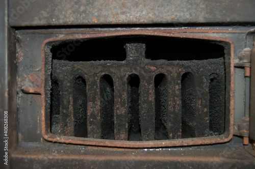 Stained unused stove with soot