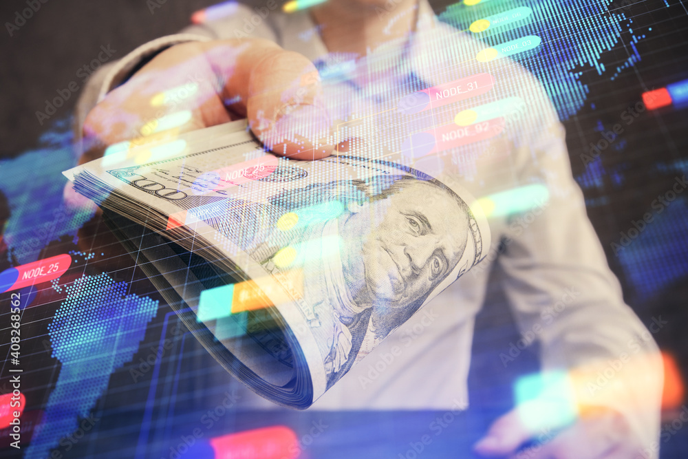 Double exposure of technology drawing hologram and us dollars bills and man hands. Data concept Double exposure of technology drawing hologram and us dollars bills and man hands. Data concept