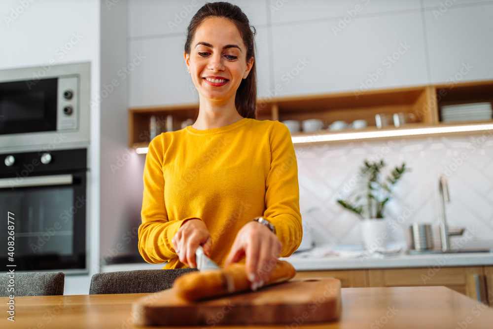 Dressed in a yellow sweater, spending time at kitchen. Dressed in a yellow sweater, spending time at kitchen.