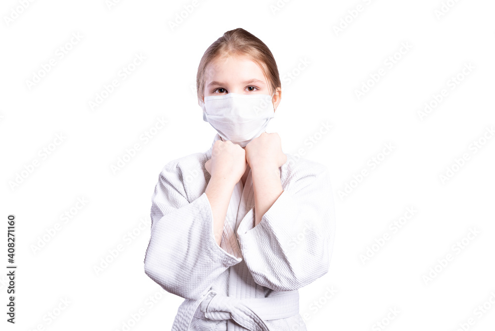 Girl in a kimono judo. Trained in a mask. Isolated on white background. Girl in a kimono judo. Trained in a mask. Isolated on white background.