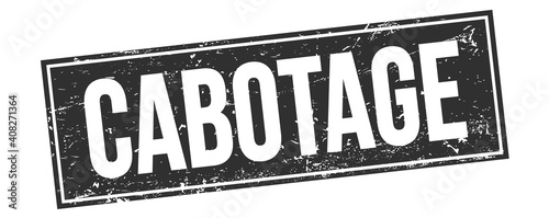 CABOTAGE text on black grungy rectangle stamp.