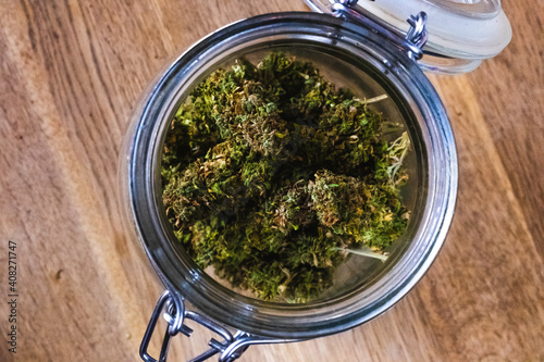 Cannabis inside of a mason jar.