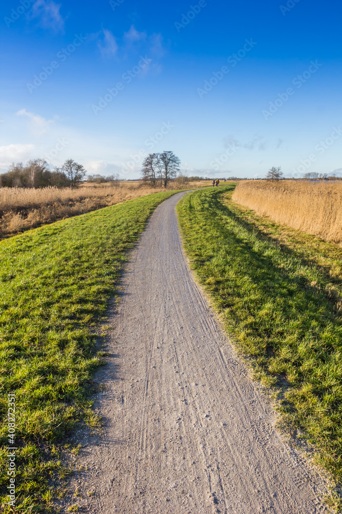 Walking path at the Schildmeer lake in Groningen, Netherlands