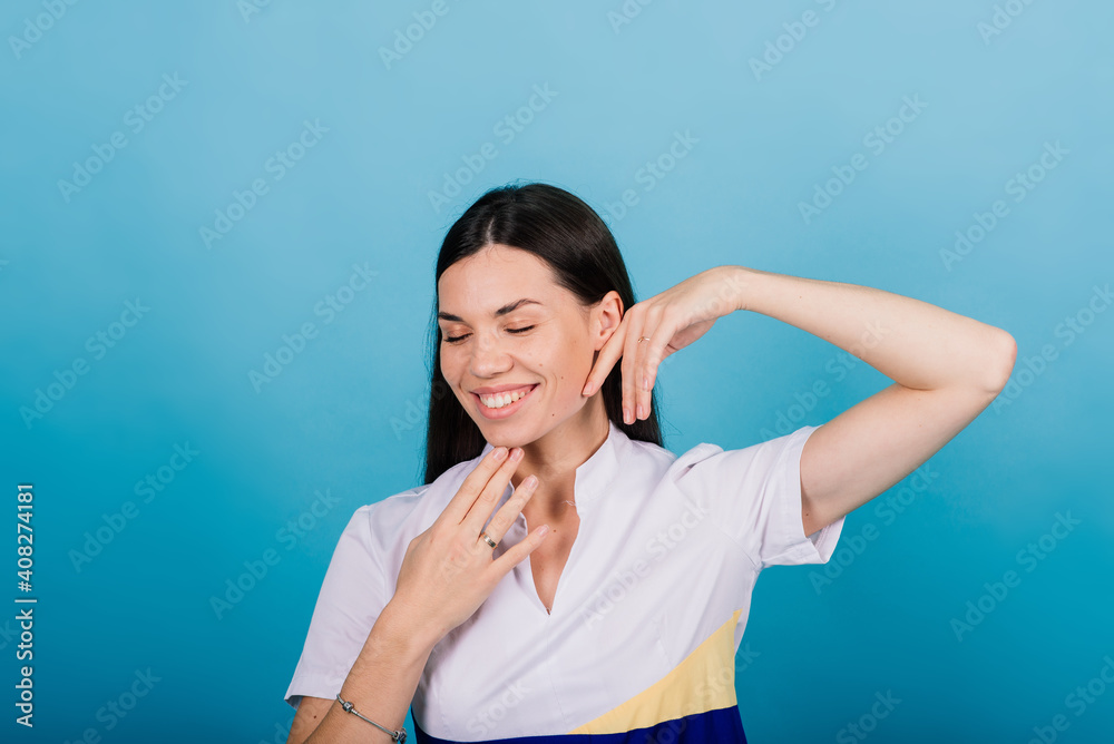 Portrait of a happy beautiful smiling woman touching her face isolated Portrait of a happy beautiful smiling woman touching her face isolated