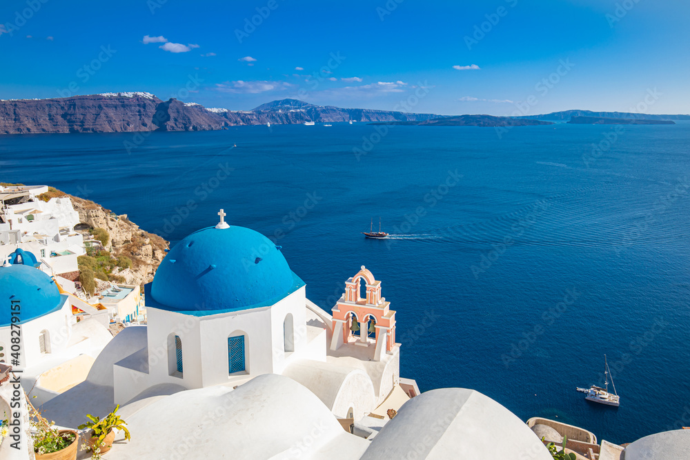 Santorini island, Greece. Incredibly romantic summer landscape on Santorini. Oia village in the morning light. Amazing view with white houses. Island of lovers, vacation and travel background concept
