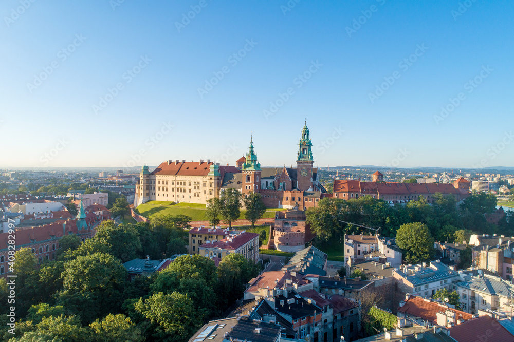 Krakow, Poland. Skyline with historic royal Wawel cathedral and castle. Aerial cityscape in sunrise light early in the morning in summer