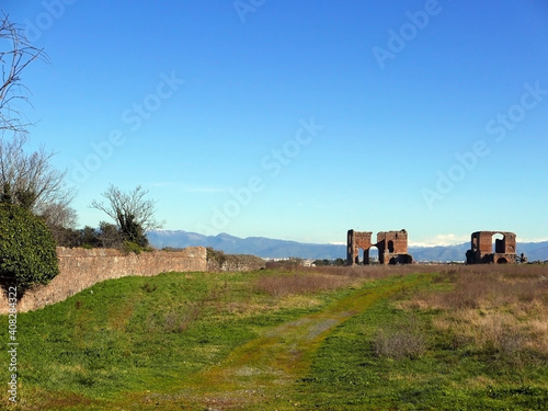 suggestive rovine nel parco dell'appia antica a roma photo