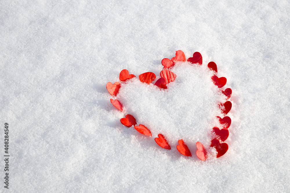concept Valentines Day: red heart in the snow concept Valentines Day: red heart in the snow