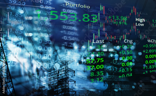 graph line of trade stock market and index number on glow blur city light blue business background