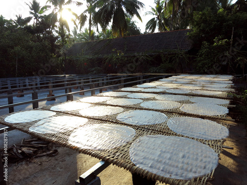 Drying rice paper crepes in a rice noodles factory in Can Tho, VIETNAM
