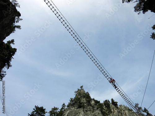 The Tibetan Bridge (Ponte Tibetano Cesana Claviere) in Claviere, ITALY. The longest Tibetan bridge in the world photo