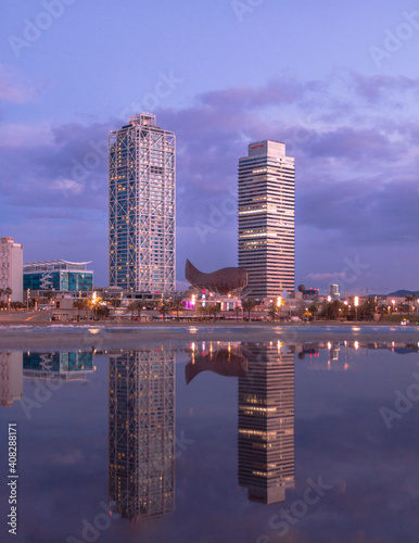 Picture of the Barcelona twin towers situed in front of the beach.