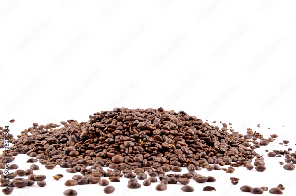Roasted coffee beans against a white background. Roasted coffee beans against a white background.
