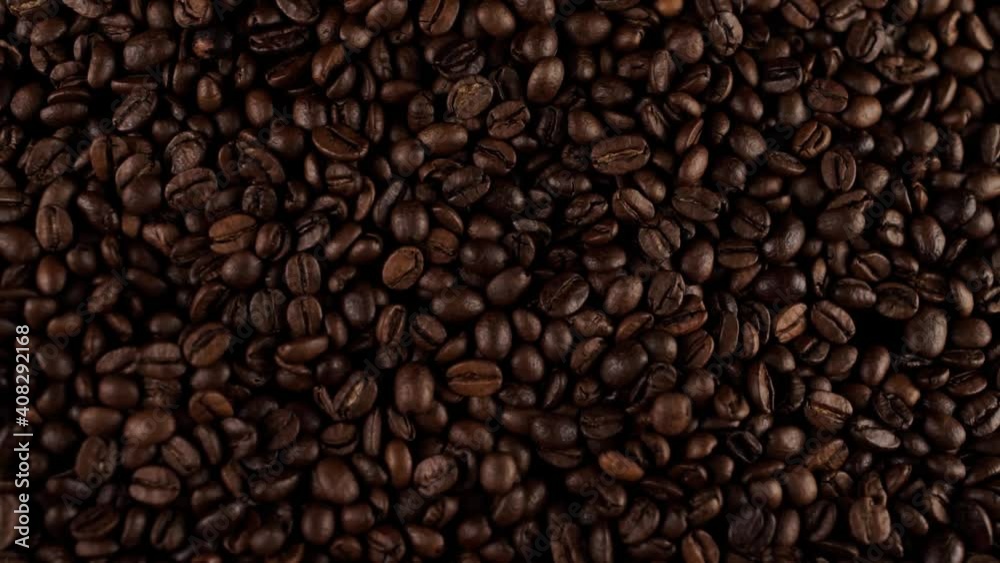 a fresh roasted coffee beans on the table a fresh roasted coffee beans on the table