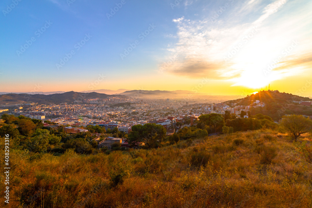 Panoramic picture of Barcelona city captured during sunrise. Panoramic picture of Barcelona city captured during sunrise.
