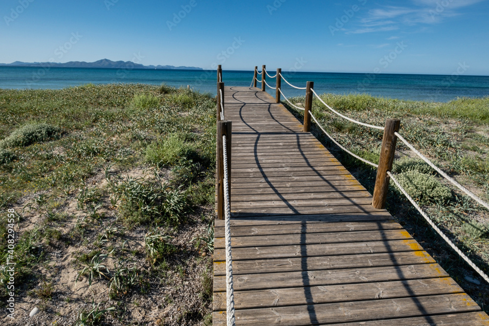 Obraz premium wooden path to protect the dunes, Arenal de sa Canova, Artà - Santa Margalida, Natural Area of Special Interest, Mallorca, Balearic Islands, Spain