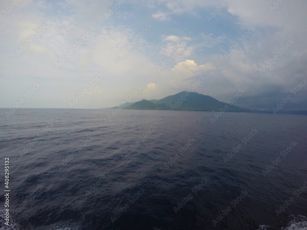 View of Weh Island from blue Indian Ocean View of Weh Island from blue Indian Ocean