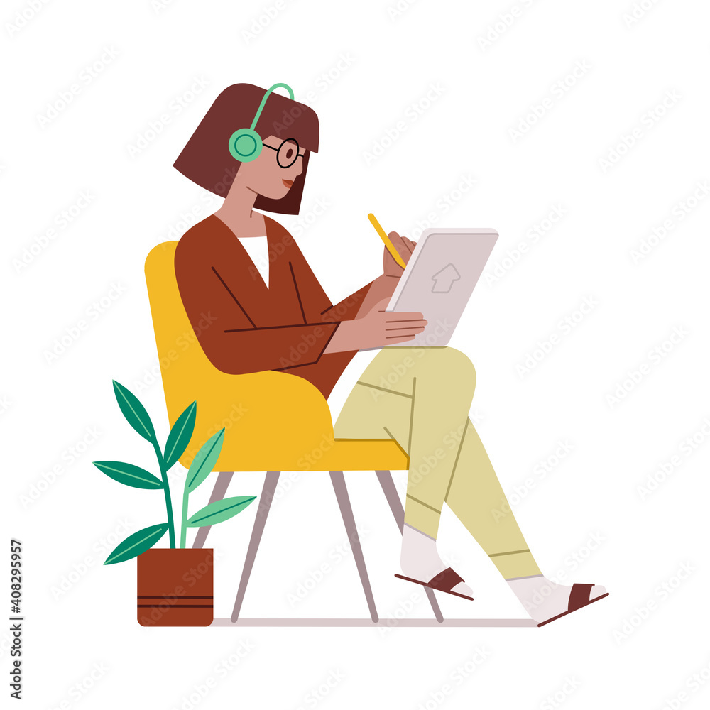 Woman with headphones is sitting on the chair and working on the tablet. Studying, working or drawing on tablet.