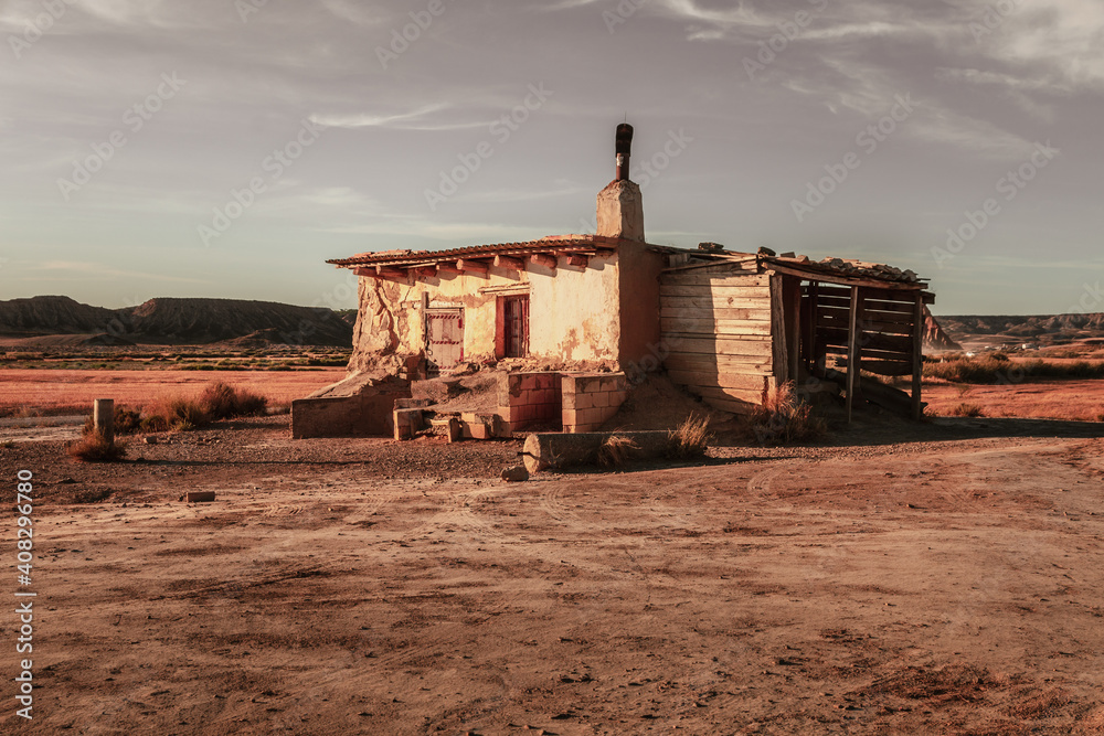 Abandoned house in Bardenas Reales desert in Navarra, Spain, captured during sunset.