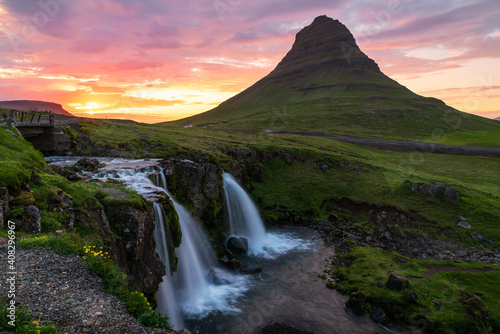 Majestic Kirkjufell under colourful sky at midnight in summer. Northern Iceland.