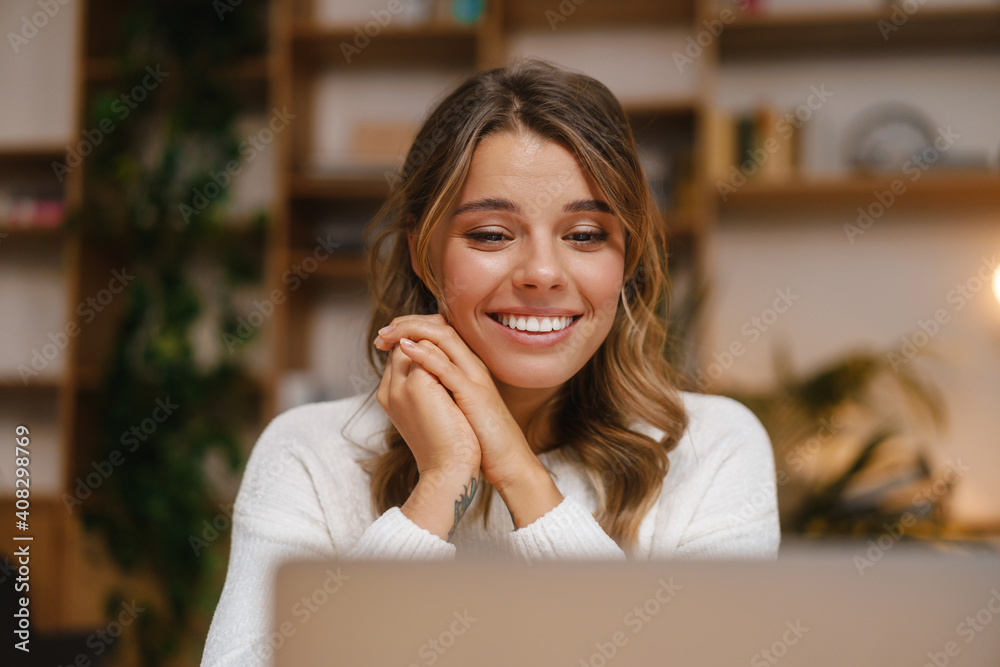 Beautiful young woman manager on a video call Beautiful young woman manager on a video call