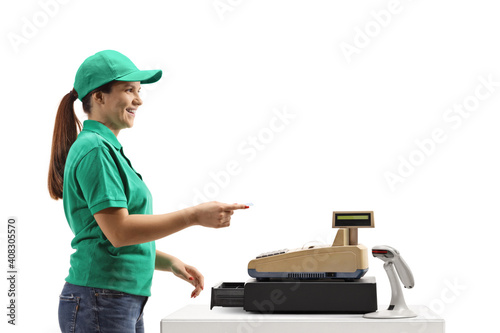 Cashier holding a credit card and smiling