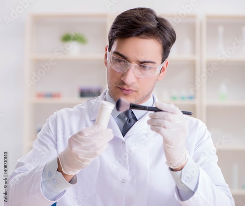 Expert criminologist working in the lab for evidence