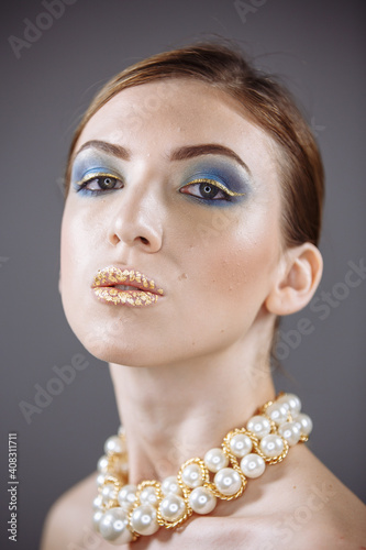 portrait of a girl on a gray background